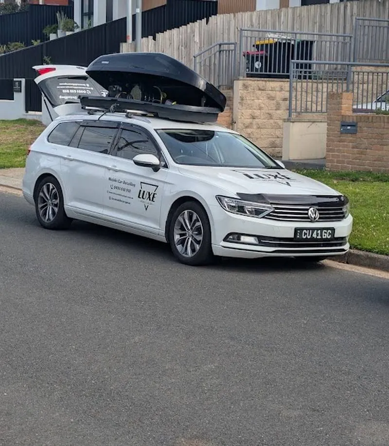 Luxe Mobile Car Spa branded mobile detailing vehicle parked at a customer's home in Sydney