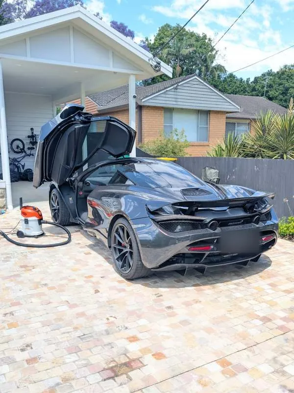 Gullwing doors, spotless | mobile car detailing by Luxe Mobile Car Spa