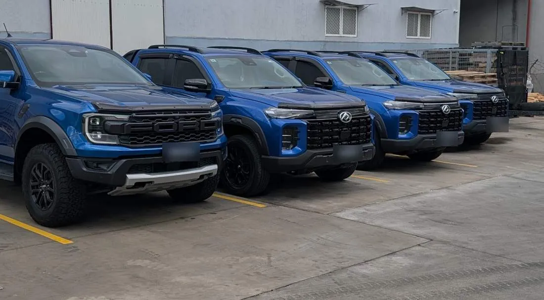 Fleet of blue utes cleaned by Luxe Mobile Car Spa, on-site fleet detailing in Sydney